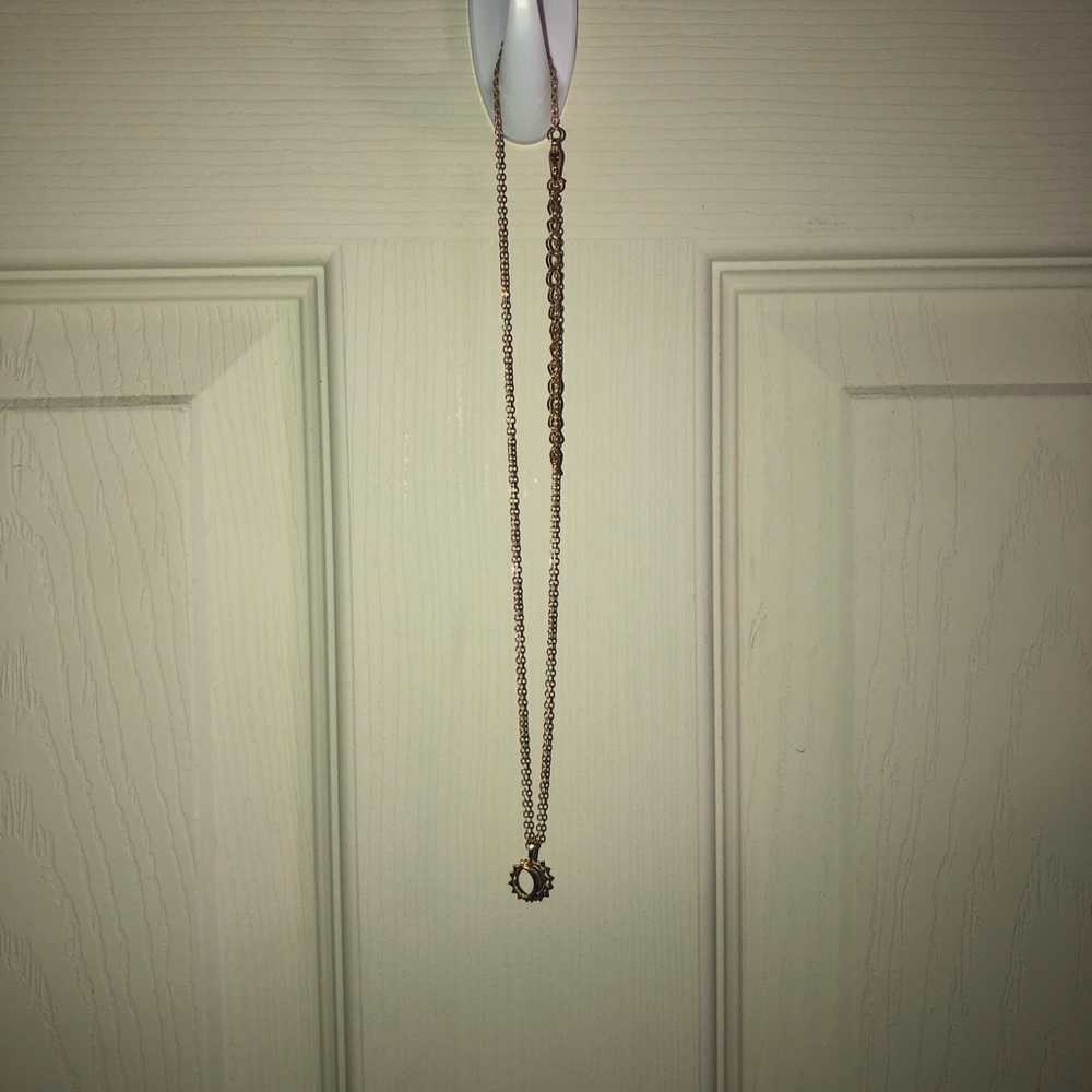 Gold sun and moon necklace